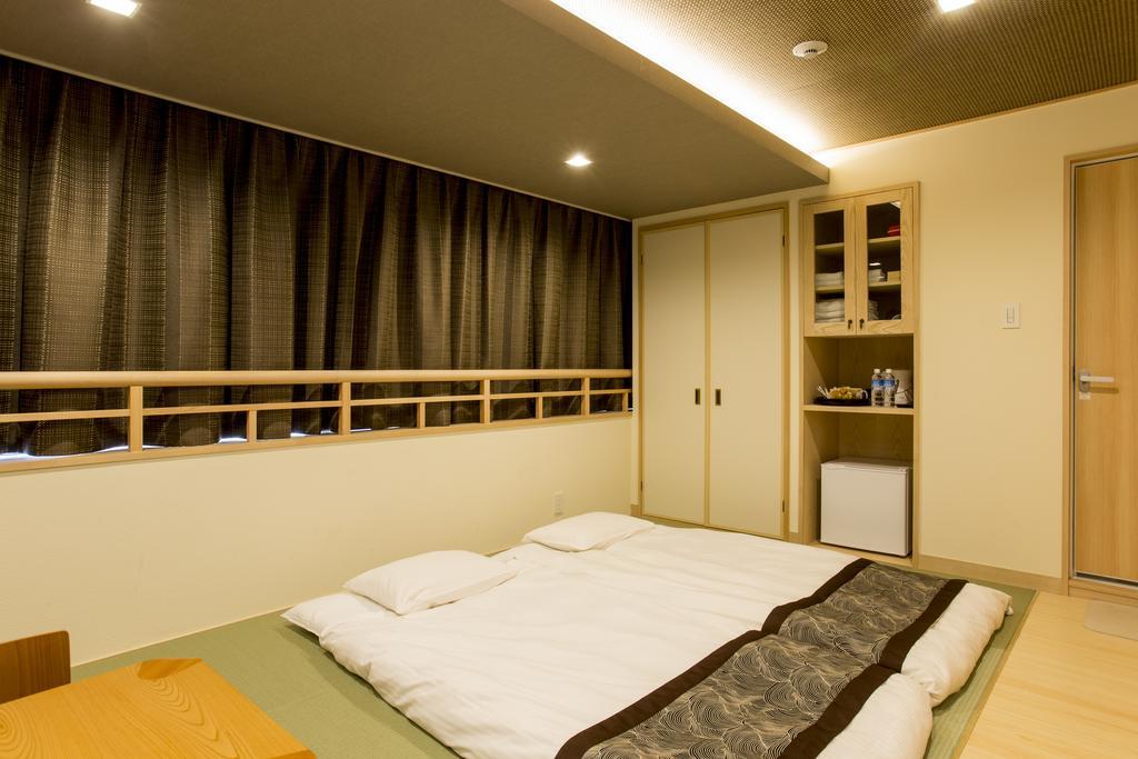 東心斎橋おおきにアパート Ookini Ryokan & Apartment Osaka Exterior foto